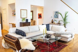 Smart TV, fireplace, books, printers