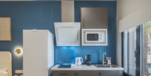 Fridge, microwave, coffee/tea maker, electric kettle