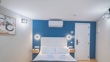 Een strijkplank/strijkijzer, gratis wifi, beddengoed