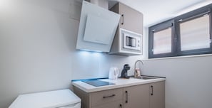 Fridge, microwave, coffee/tea maker, electric kettle