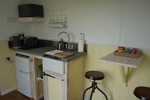 Fridge, microwave, toaster, cookware/dishes/utensils