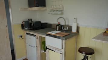 Fridge, microwave, toaster, cookware/dishes/utensils