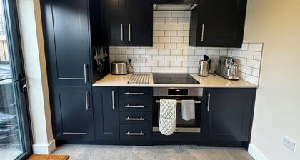 Charming New Forest property with a garden and countryside views in village hub