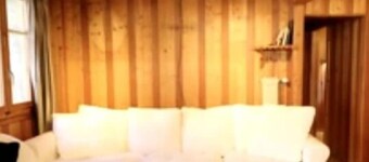 Chalet in the mountains, wooden interior, cosy, with a beautiful view