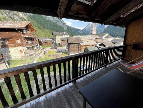 Chalet in the mountains, wooden interior, cosy, with a beautiful view
