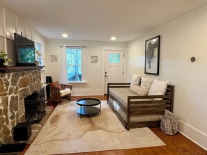Smart TV, fireplace, books