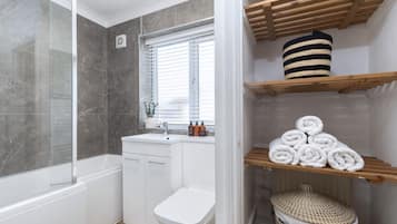 Hair dryer, towels, soap, shampoo