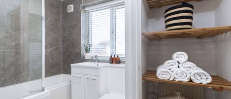 Hair dryer, towels, soap, shampoo