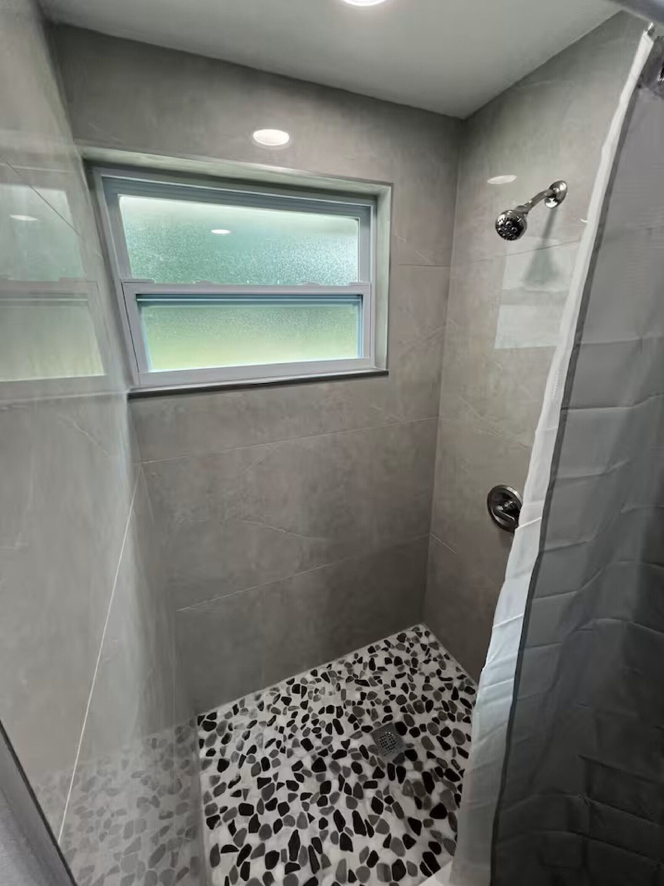 Shower, towels, soap, toilet paper
