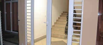 Cozy 2-bedroom apartment in welcoming Flic en Flac with WiFi, AC, close to beach