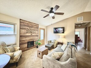 Smart TV, fireplace, DVD player, books