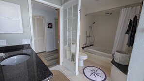 Shower, jetted tub, hair dryer, towels