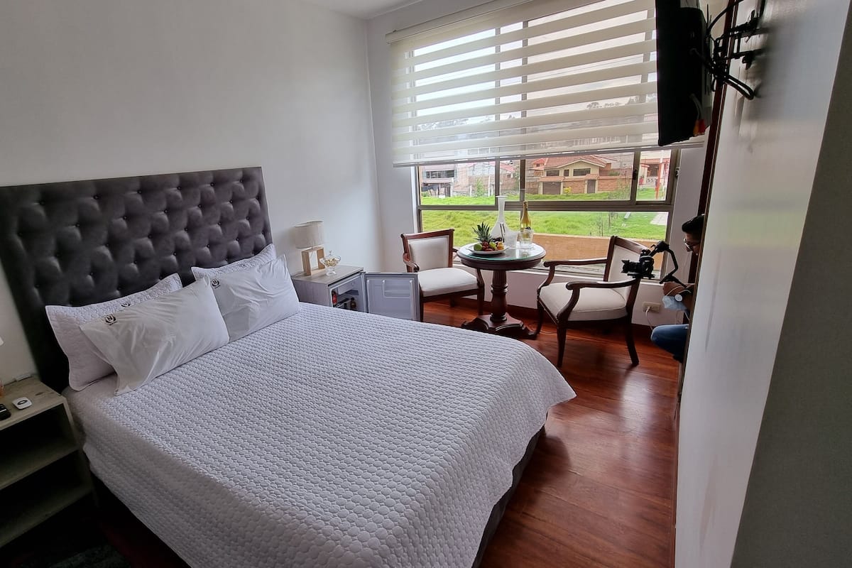 Deluxe Double Room, Garden View | Desk, free WiFi