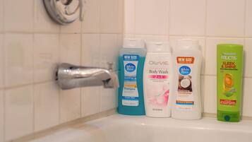 Shower, hair dryer, towels, soap