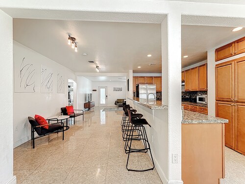 Updated & spacious 2-bedroom, 2 bath home walking distance to the beach.