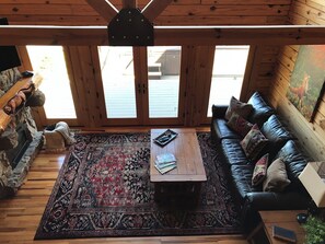 Smart TV, fireplace, books, printers