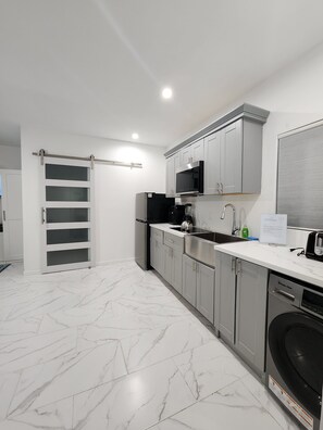 Fridge, microwave, stovetop, coffee/tea maker