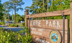 A wooden sign for Empire Park, indicating it is a park and recreation area in Wilmington. - Recreation Central ILM (Wilmington)