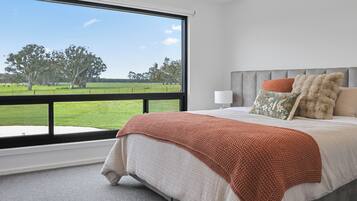 Laptop workspace, blackout curtains, soundproofing, iron/ironing board