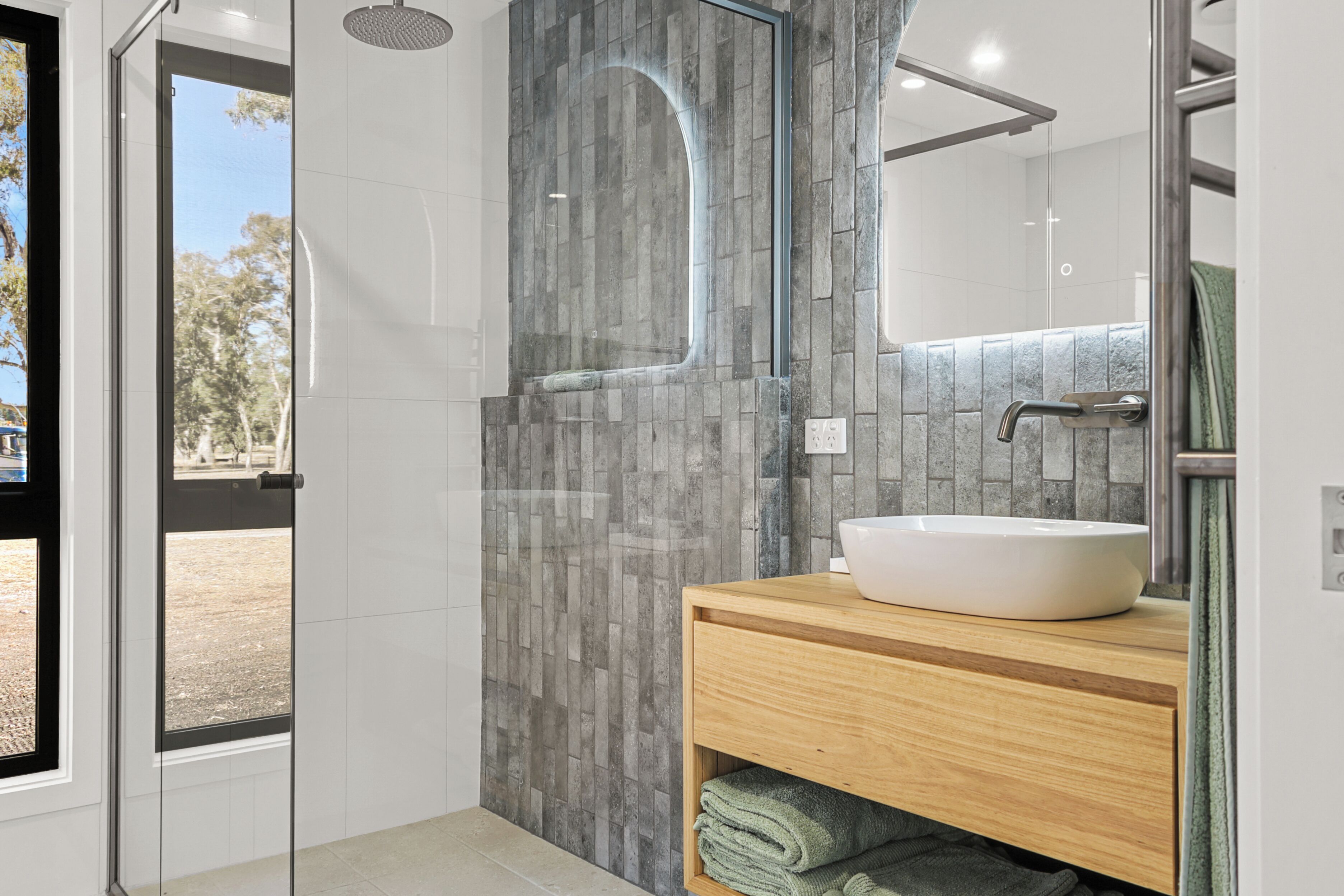 Separate bathtub and shower, hair dryer, bathrobes, slippers
