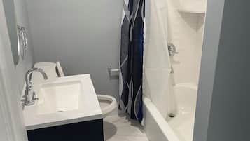 Hair dryer, towels, soap, toilet paper