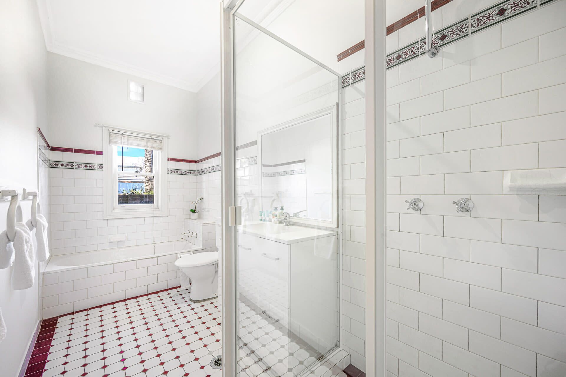 Shower, hair dryer, towels, shampoo