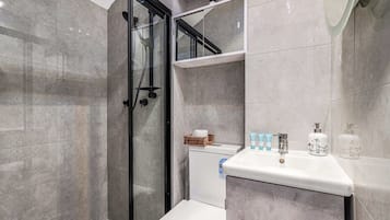 Shower, hair dryer, shampoo