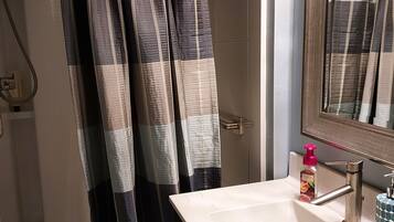 Shower, towels, toilet paper