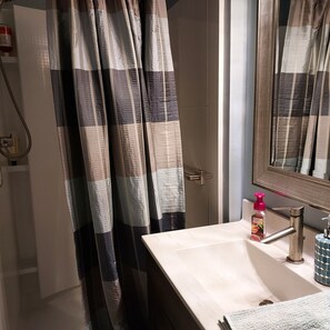 Shower, towels, toilet paper