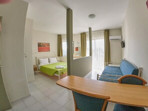 Classic Triple Room, Balcony | Desk, blackout drapes, free WiFi - Ivory Hotel  (Theologos)