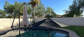 Spacious 4-bedroom house in charming Litchfield Park with WiFi, AC, and Pool