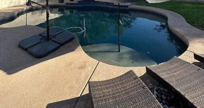 Spacious 4-bedroom house in charming Litchfield Park with WiFi, AC, and Pool