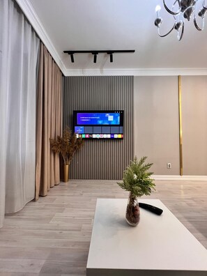 Comfort Condo, 1 King Bed with Sofa bed, Pets allowed, Courtyard View | Living area - World Retreats (Almaty)