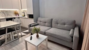 Comfort Condo, 1 King Bed with Sofa bed, Pets Allowed, Courtyard View | Living area - World Retreats (Almaty)