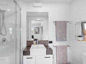 Shower, hair dryer, towels, soap