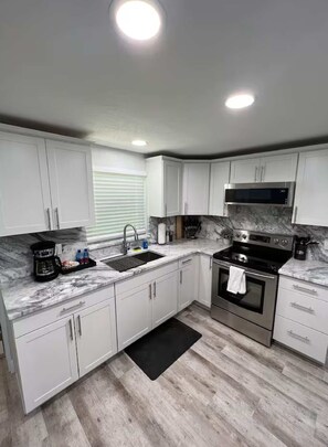Fridge, microwave, oven, coffee/tea maker