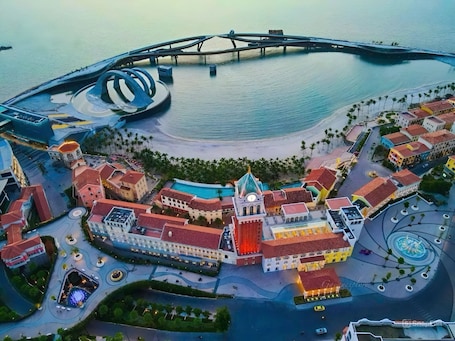 On the beach, white sand, beach shuttle. Haus Stay Sunset Town Phu Quoc