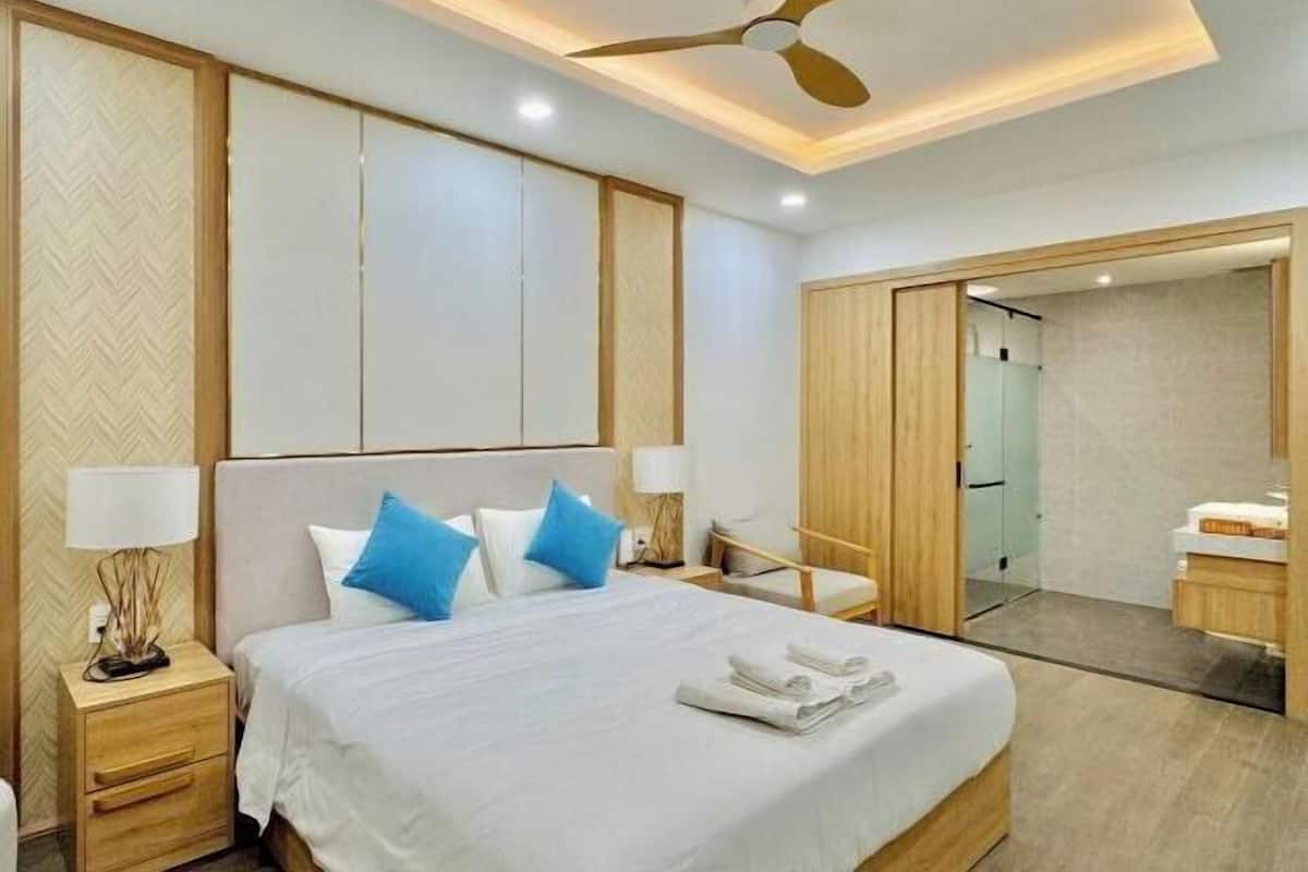 Luxe beddengoed, pillowtop-bedden, een minibar met enkele gratis items