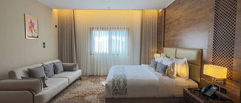 Studio, 1 King Bed | Living area | TV