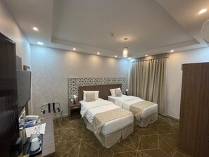 Twin Room, 2 Single Beds | Premium bedding, pillow-top beds, iron/ironing board - Mayar Golden Hotel (Madinah)