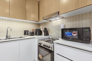 Microwave, stovetop, coffee/tea maker, toaster