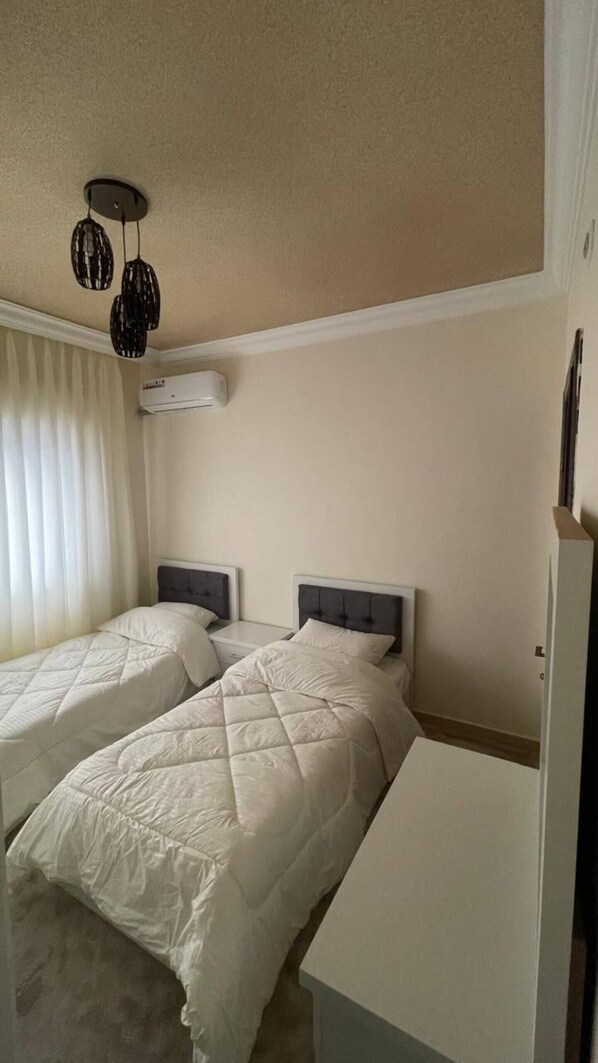 3 dormitorios, tabla de planchar con plancha, wifi y ropa de cama