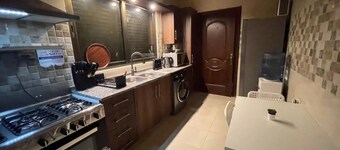Al Mansour view apartment 3 BDR, Cozy for families.