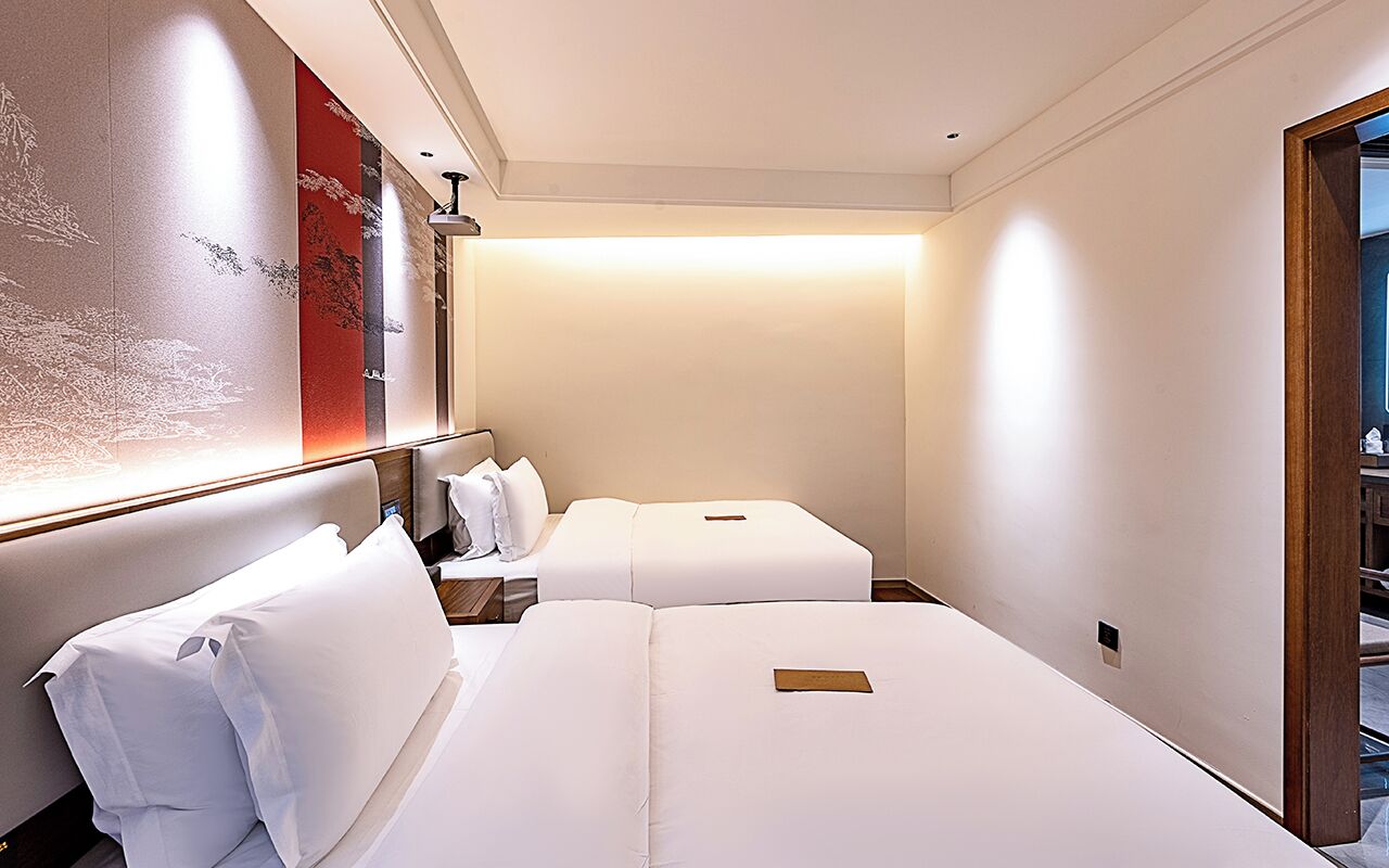 Premium bedding, down comforters, pillowtop beds, minibar