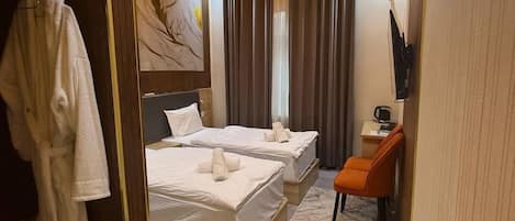 Chambre Deluxe avec lits jumeaux | Literie de qualité supérieure, bureau