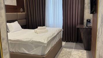 Kamar Double Comfort, pemandangan halaman | Meja kerja, Wi-Fi gratis, dan seprai linen