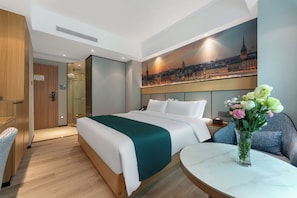 Habitación empresarial doble | Cortinas blackout, tabla de planchar con plancha y wifi gratis