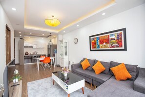 50-inch TV with cable channels, fireplace