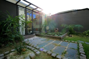 Luxury Apartment, Garden View | Terrace/patio