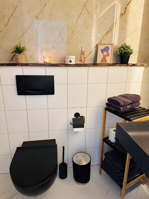 Hair dryer, towels, soap, toilet paper